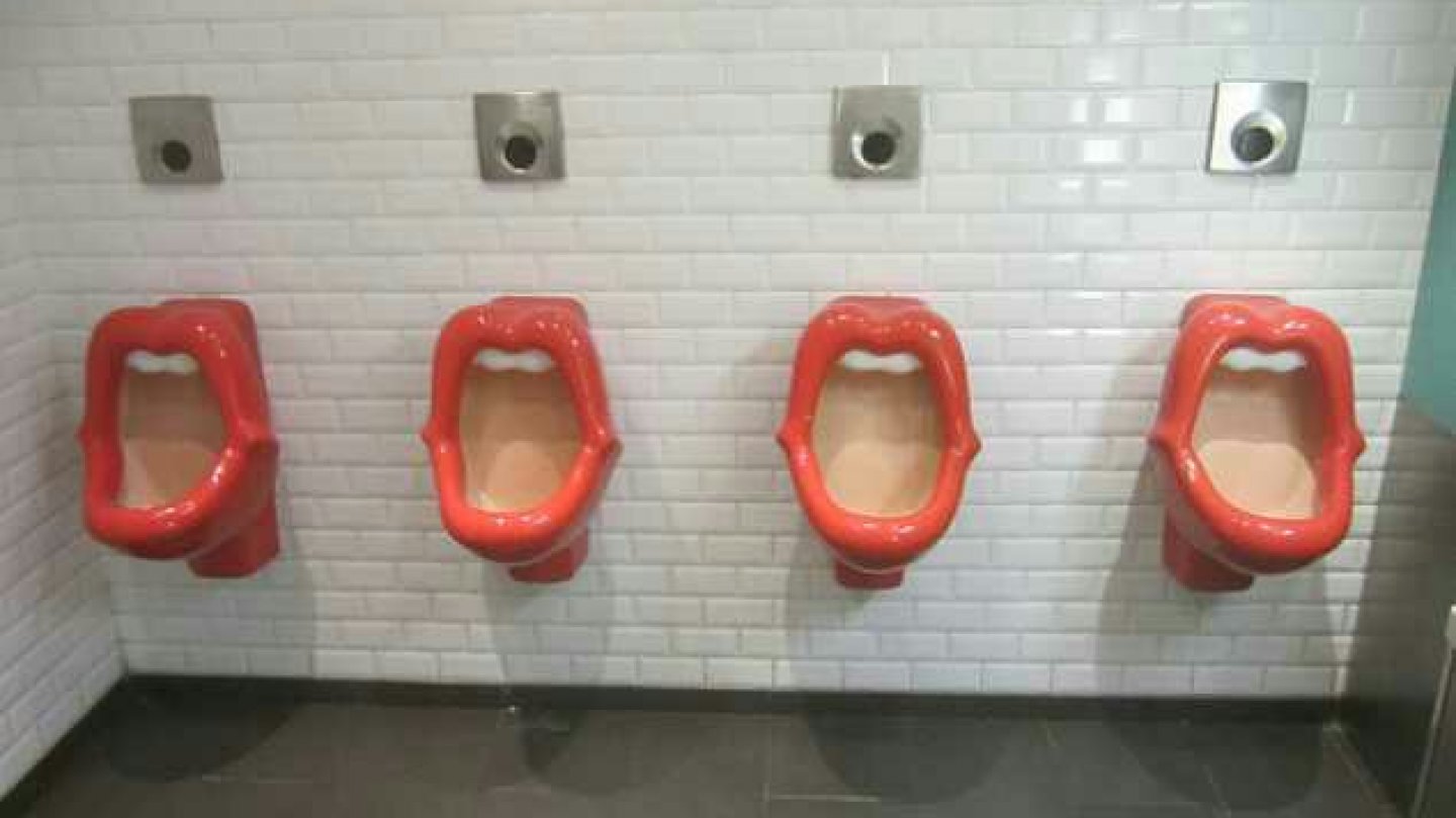 Shemale using urinal