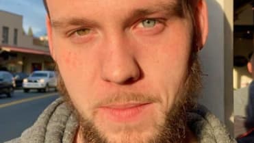 Muž trpící heterochromií - má každé oko jinak barevné Muž trpící heterochromií - má každé oko jinak barevné